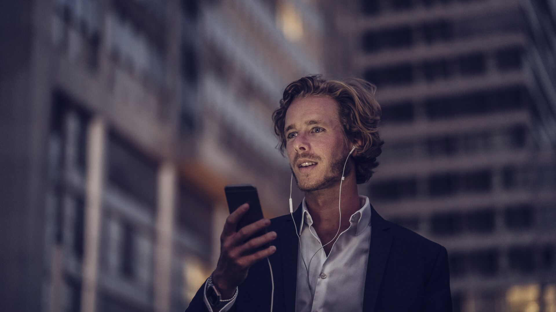 businessman-in-the-city-at-dusk