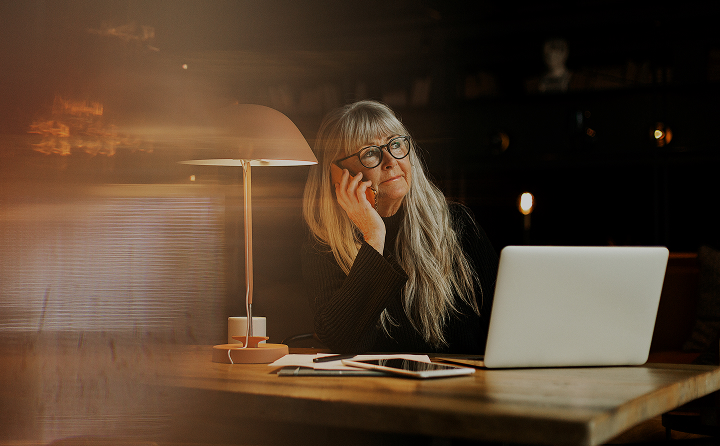 woman sitting by the desk