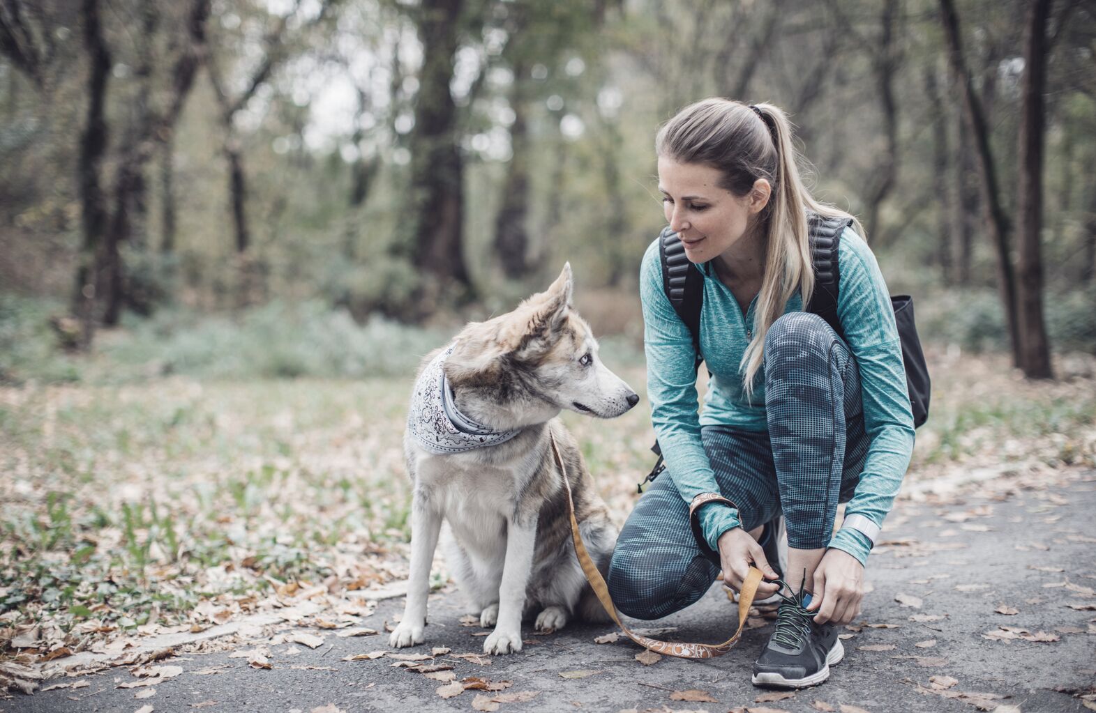 Woman in fall forest