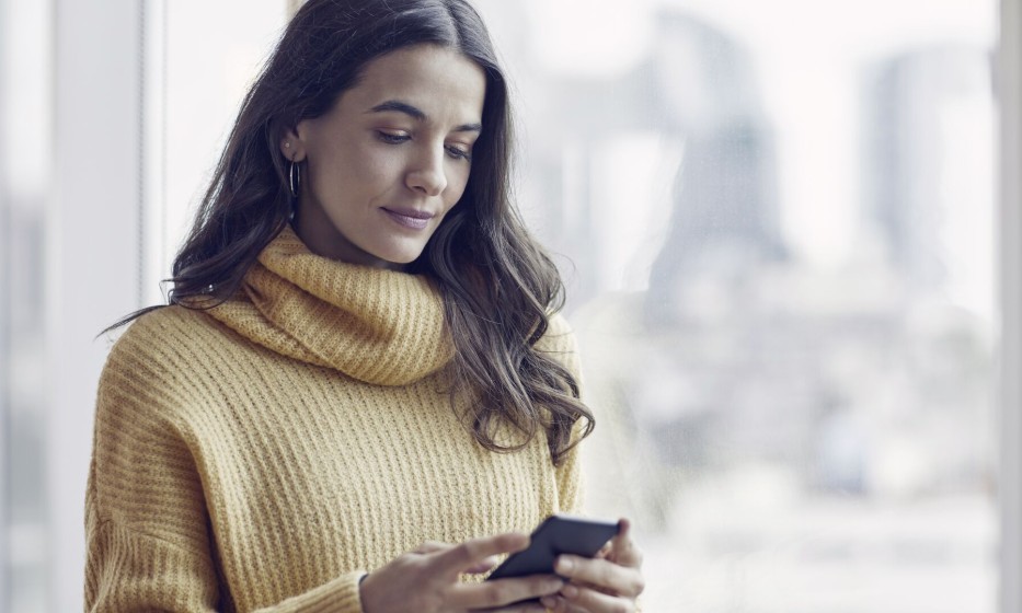 Woman mid-adult using phone