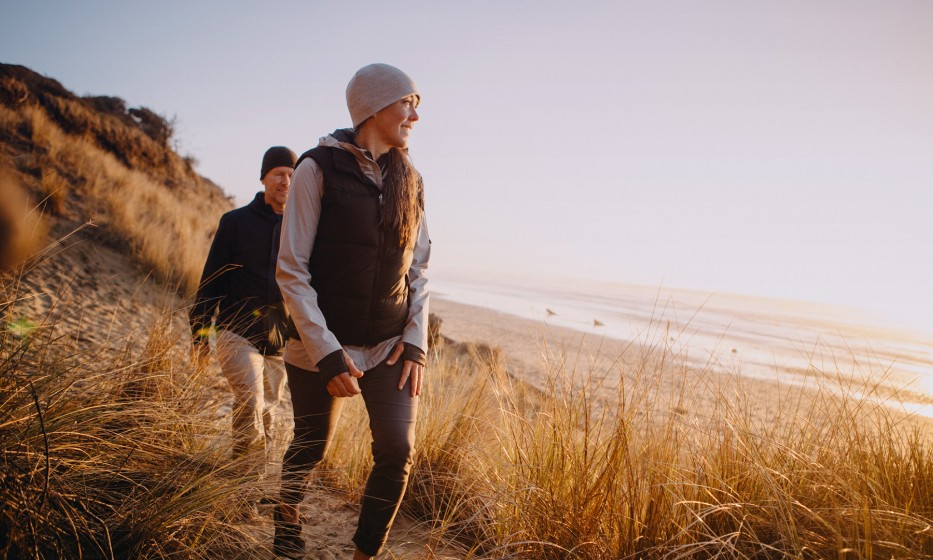 Couple hiking on beach