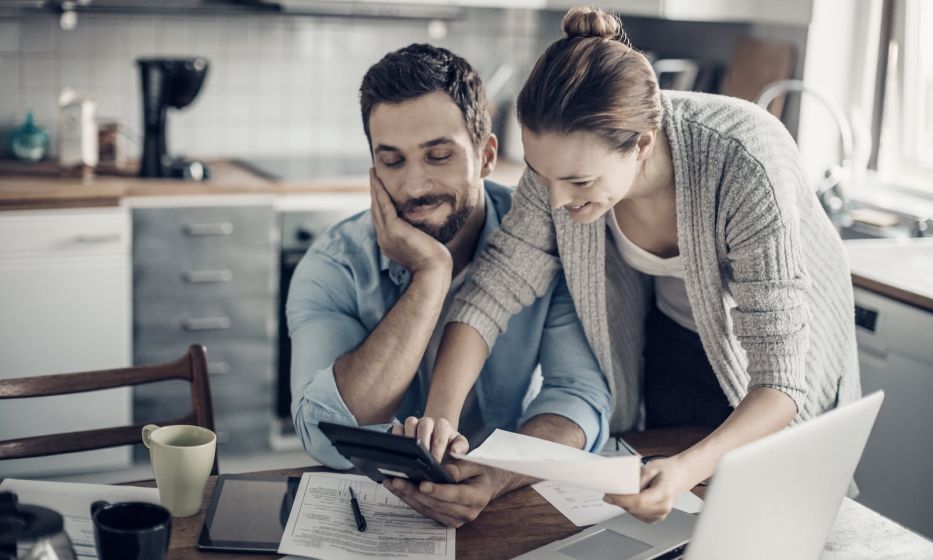 young couple calculating