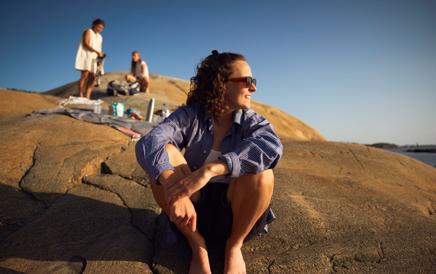Woman sitting in the sun