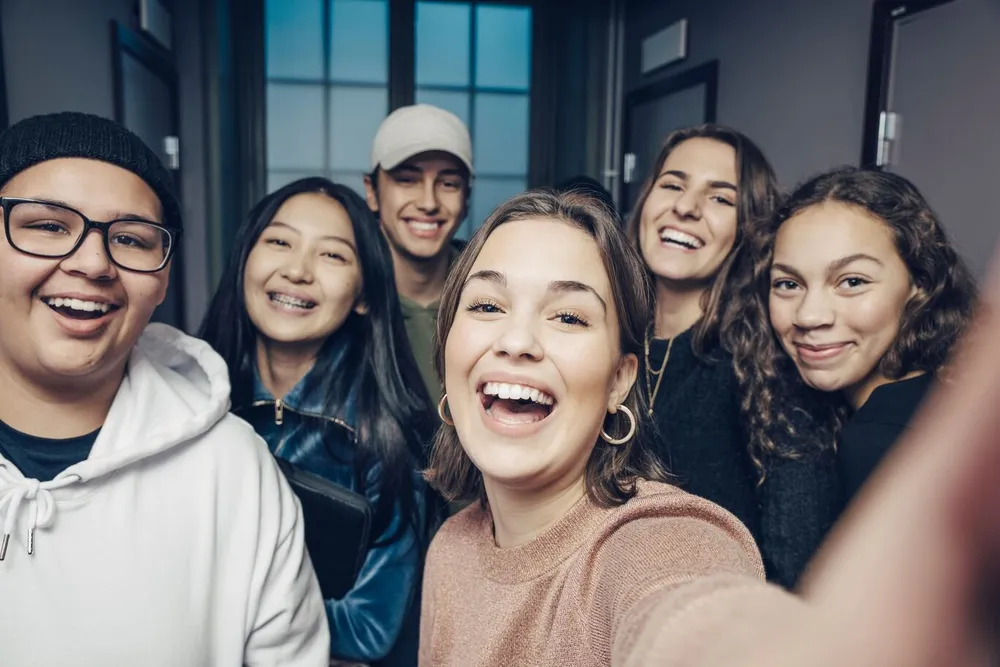 Teenagers taking a selfie